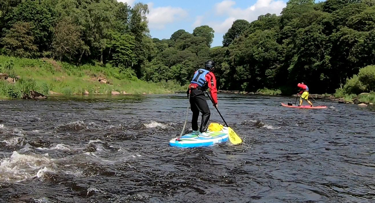 White water paddleboarding river Eden